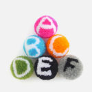 Faire des pompons typographiques